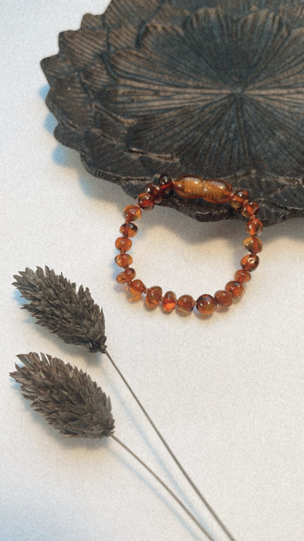 Barnsteenarmband cognac glans 12 cm (newborn armbandje)